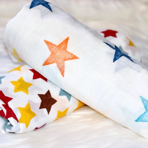 Reach for the Stars Muslin cotton swaddle set . Two muslin swaddles, one large star pattern, one small star pattern.